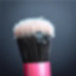 Close-up of a clean makeup brush with water droplets
