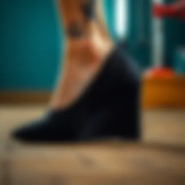 Close-up of the unique design elements of a black wedge shoe