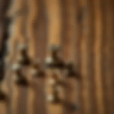 Decorative Tacks in Wood Application Close-up of decorative tacks embedded in a wooden surface.