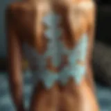 Detailed view of an elegant open back lingerie set showcasing intricate lacework.