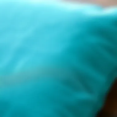 Close-up of teal throw pillow texture and fabric