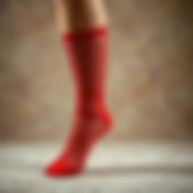 Artistic display of red fish net socks on a textured background
