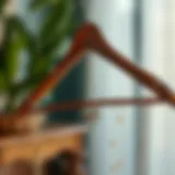 Elegant wooden necklace hanger showcasing intricate craftsmanship