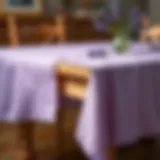 Lavender tablecloth draped elegantly over a rustic wooden table