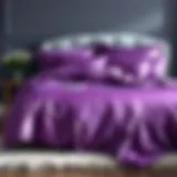 Luxurious purple satin comforter set on a plush bed