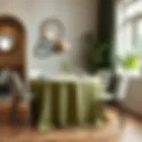 Elegant sage green table cover set in a sophisticated dining room