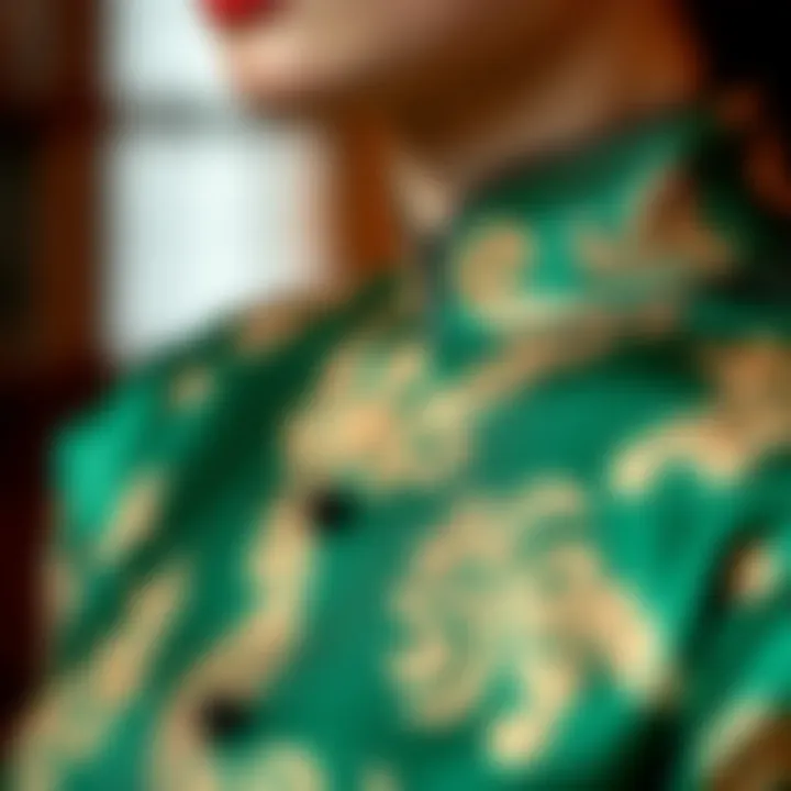 Close-up of intricate fabric patterns of a green cheongsam