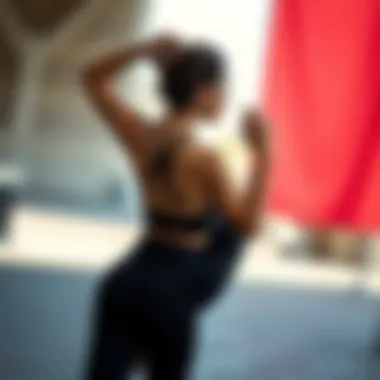 Model demonstrating flexibility in ruched back yoga pants