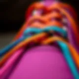 A close-up view of vibrant flat colored shoelaces arranged in a stylish manner