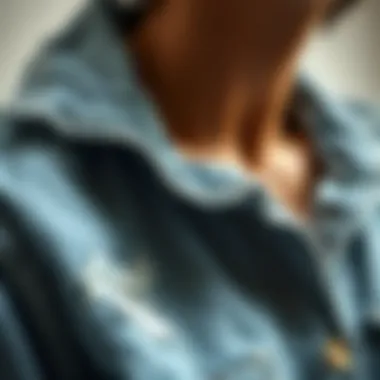 Close-up of Distressed Details A close-up of distressed details on a denim shirt, highlighting the craftsmanship and unique style.
