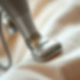Close-up of a fabric shaver on a garment removing fuzz